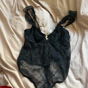 Lace Bodysuit with heart detail in a size medium